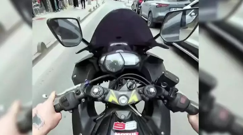 Tek tekerlek üzerinde ilerleyen motosikletin sürücüsüne 71 bin lira ceza